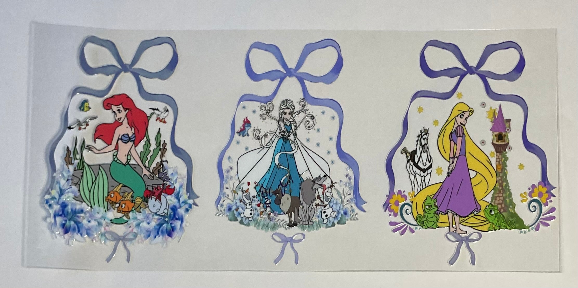 Three characters with bows