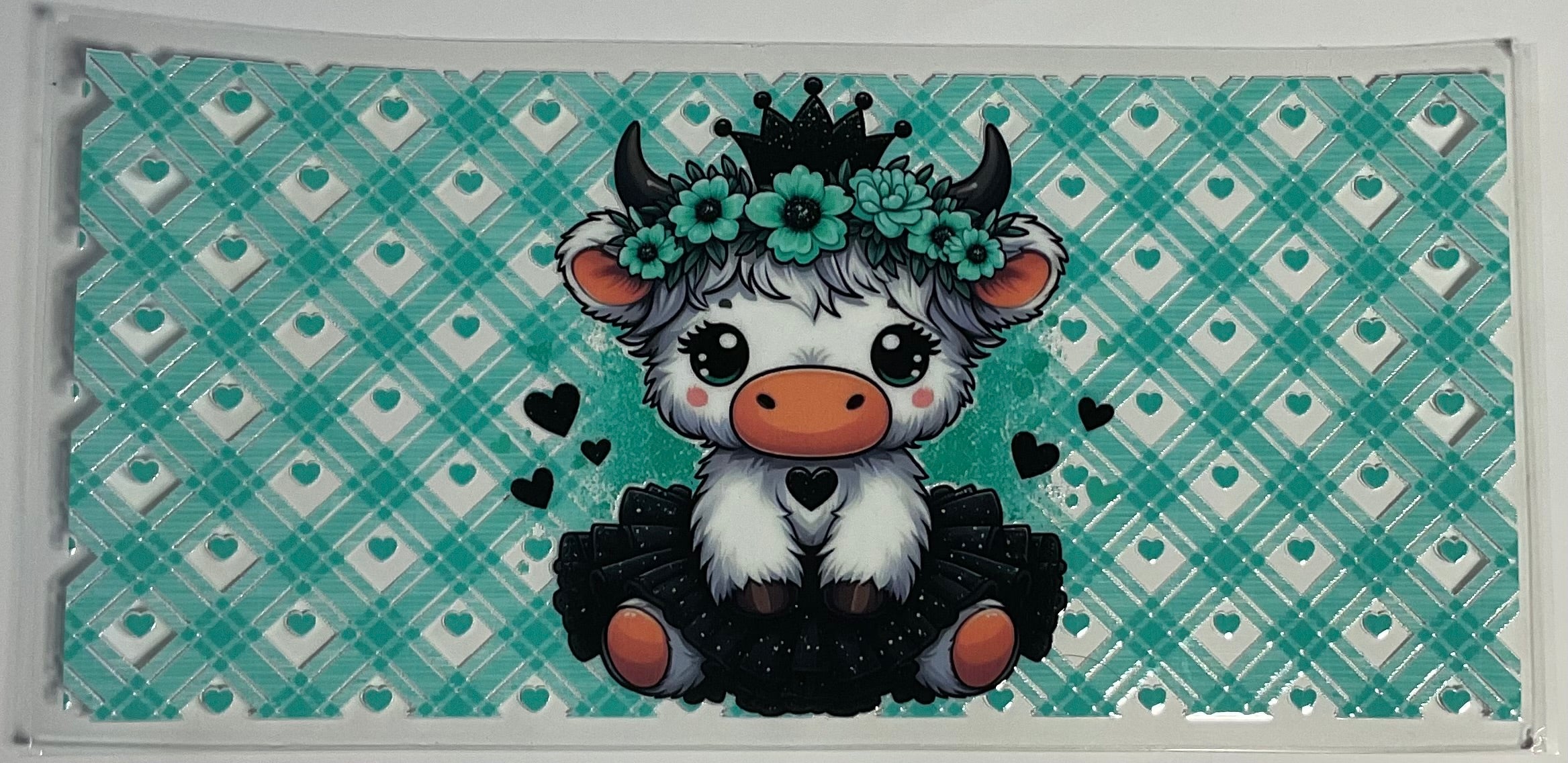 Cow with teal