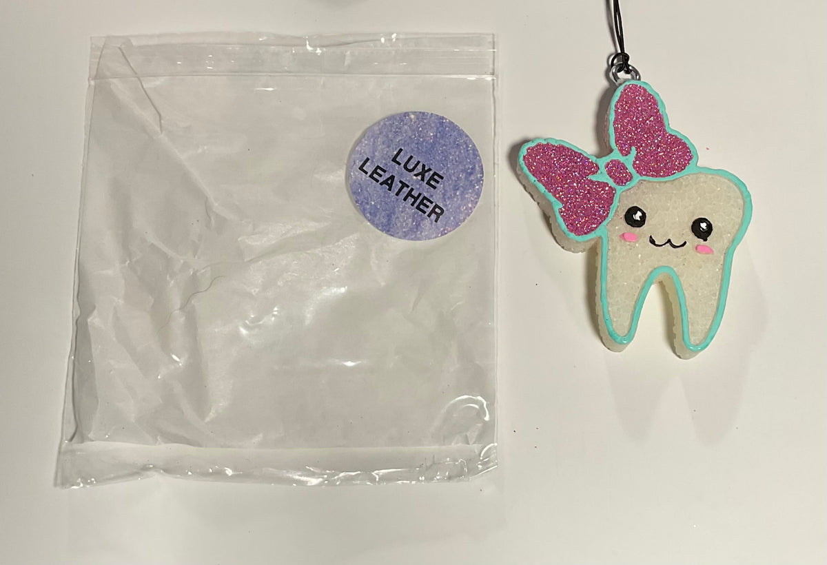 Freshie- Tooth w/ bow - Scent: Luxe Leather