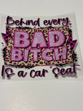 Behind ever Bad B*tch is a car seat